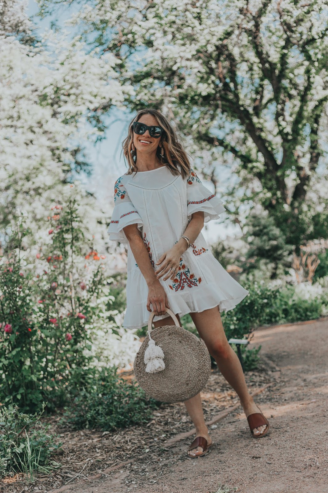Chicwish Boho Floral Embroidered Dress styled by popular Colorado fashion blogger, Leah Behr