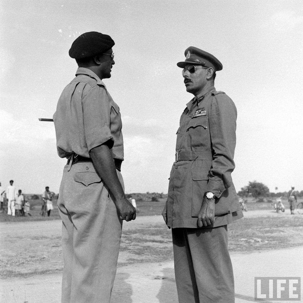 Major General Syed Ahmed El Edroos (at right) offers his surrender of the Hyderabad State Forces to Major General (later General and Army Chief) Joyanto Nath Chaudhuri at Secunderabad | Operation Polo | Hyderabad Police Action | Annexation of Hyderabad, Hyderabad (Deccan), Telangana, India | Rare & Old Vintage Photos of Operation Polo, Hyderabad (Deccan), Telangana, India (1948)
