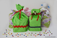 http://www.cucicucicoo.com/2014/12/easy-diy-gift-bags-boxed-corners/