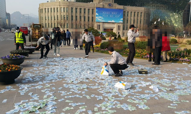 This woman threw 2 million worth cash in the streets. What the people did, will shock you! This woman threw 2 million worth cash in the streets. What the people did, will shock you!