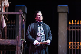 IN REVIEW: baritone MALCOLM MACKENZIE as Scarpia in North Carolina Opera's April 2019 production of Giacomo Puccini's TOSCA [Photograph by Eric Waters, © by North Carolina Opera]