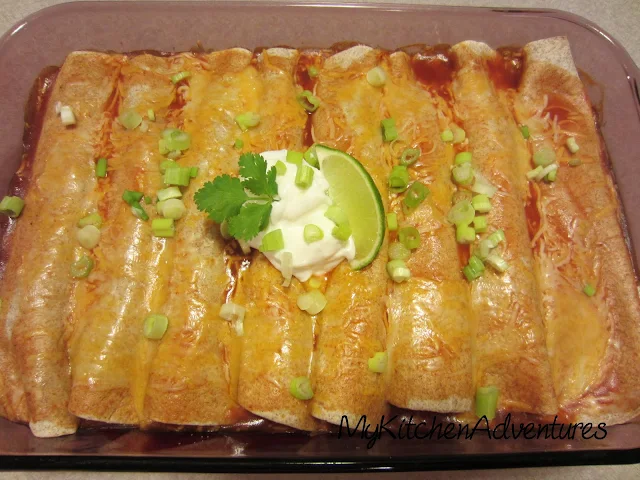 Baked chicken and zucchini enchiladas in pan