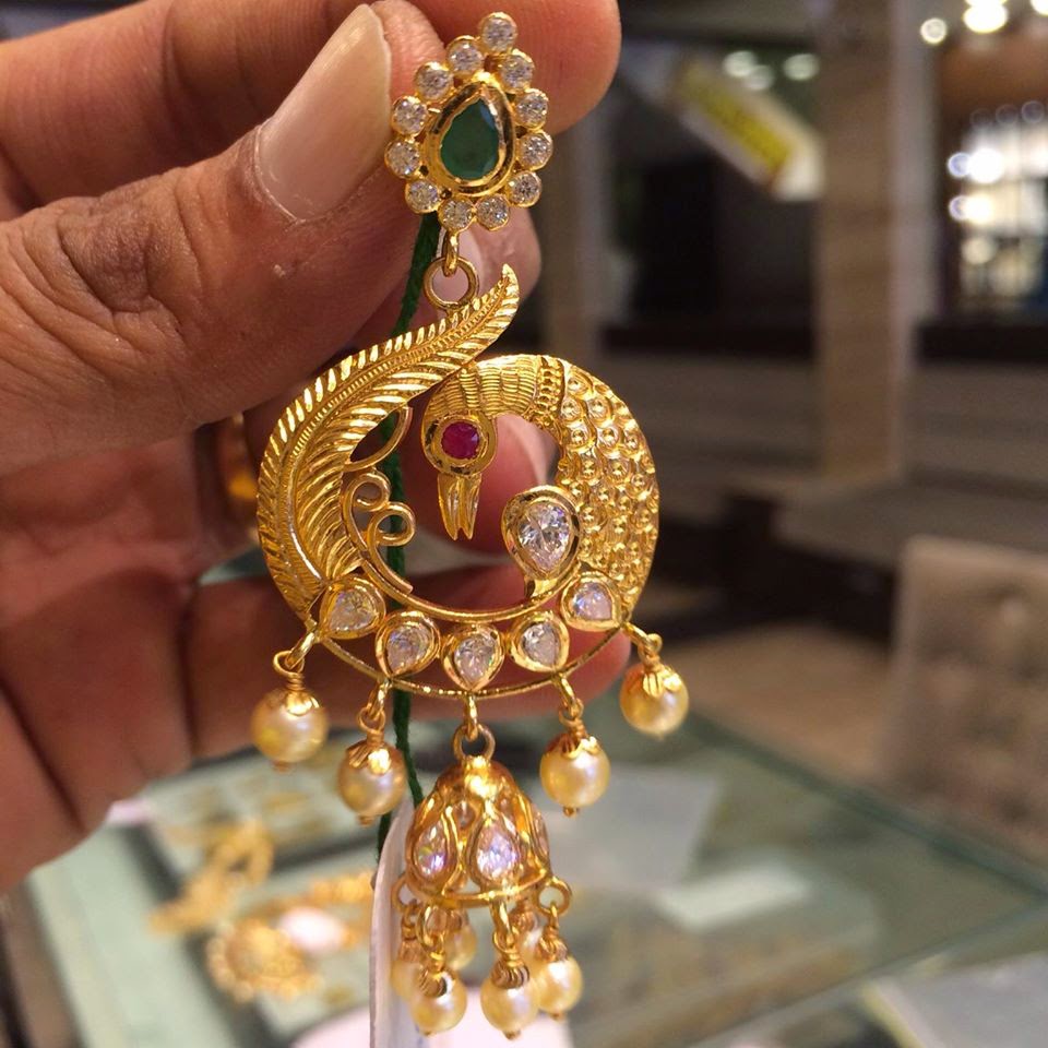 Gold Jewellery Designs: Peocock design ear hangings
