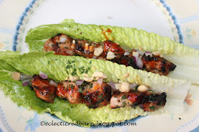 Eclectic Red Barn: Make a marinade for the pork; grill and then add roasted peanuts, cilantro, cucumbers and scallions.Wrap in lettuce leaves.