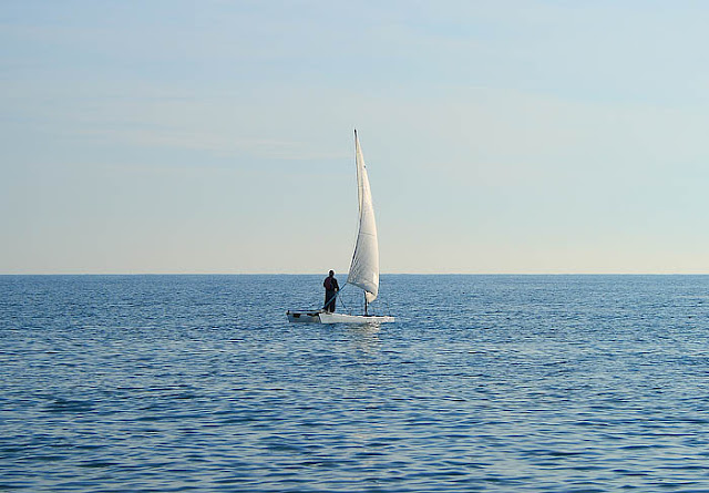 Man on a catamaran