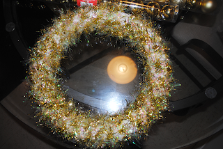 A Pinterest-inspired DIY for making a Christmas ornament wreath.