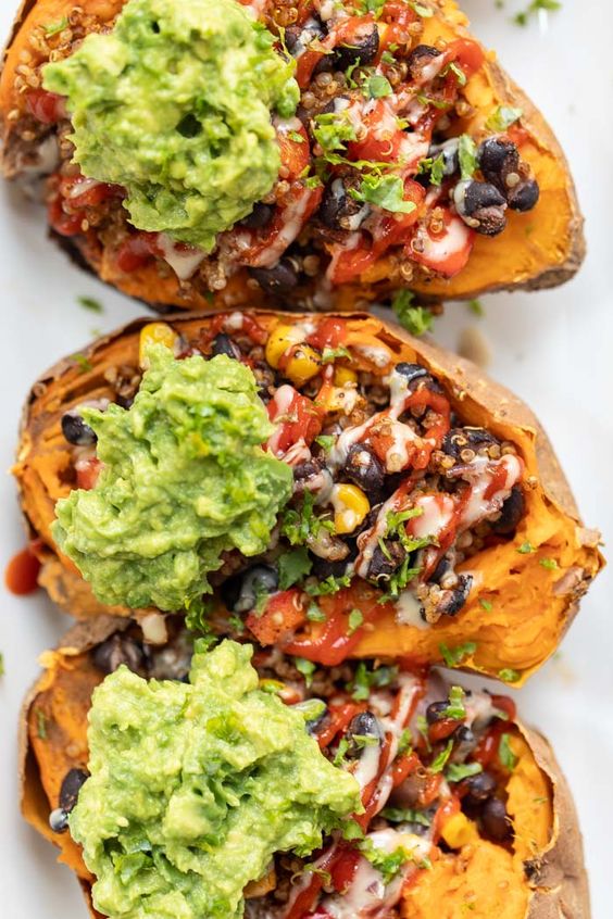 This recipe for Mexican Quinoa Stuffed Sweet Potatoes is an amazing way to pack in a ton of plant-based protein in a tasty, gluten-free and simple meal!