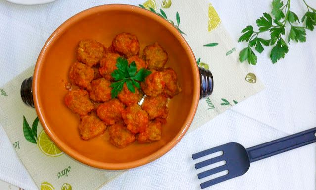 pumpkin and minced meat meatballs in tomato sauce