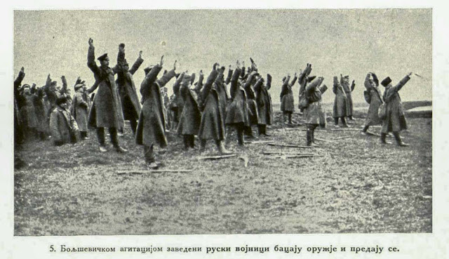 Russian soldiers who have been led astray by Bolshevist Agitators throw down their arms and surrender to the enemy