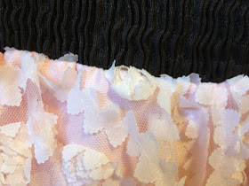 up close of 3 inch waistband and lace flower chiffon with satin underlay