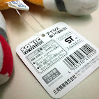 Tag back of Tails stuffed toy