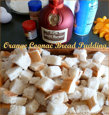 Orange Cognac Bread Pudding is a simple crockpot recipe featuring orange cognac, a little white chocolate and a hint of cinnamon. | Recipe developed by www.BakingInATornado.com | #recipe #crockpot #dessert