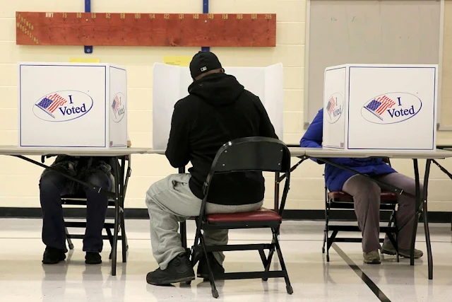 Image Attribute: People vote in the U.S. presidential election at Potomac Middle School in Dumfries, Virginia, U.S., November 8, 2016. REUTERS/Joshua Roberts