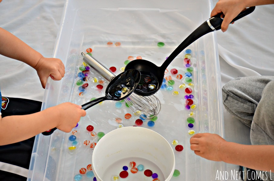 Fine motor practice for toddlers and preschoolers with a simple water sensory bin from And Next Comes L