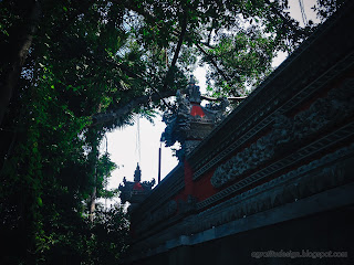 Wall Of Balinese Hindu Temple Building With Natural Trees Around It At Tangguwisia Village, North Bali, Indonesia