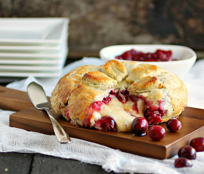 Baked Brie with Herbed Pastry and Rum Cranberry Compote