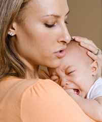 Mother soothing infant