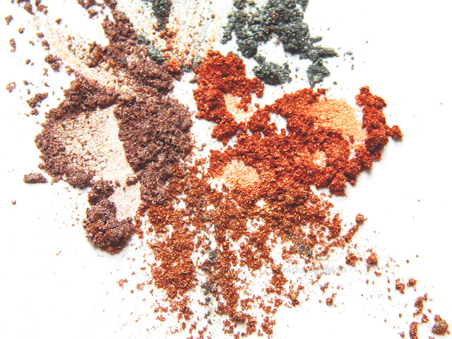 glitter pigments scattered on a white background
