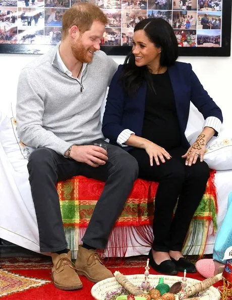 Meghan Markle wore Alice + Olivia Simpson blazer, Birdies blackbird smoking slippers, Boh Runga gold studs