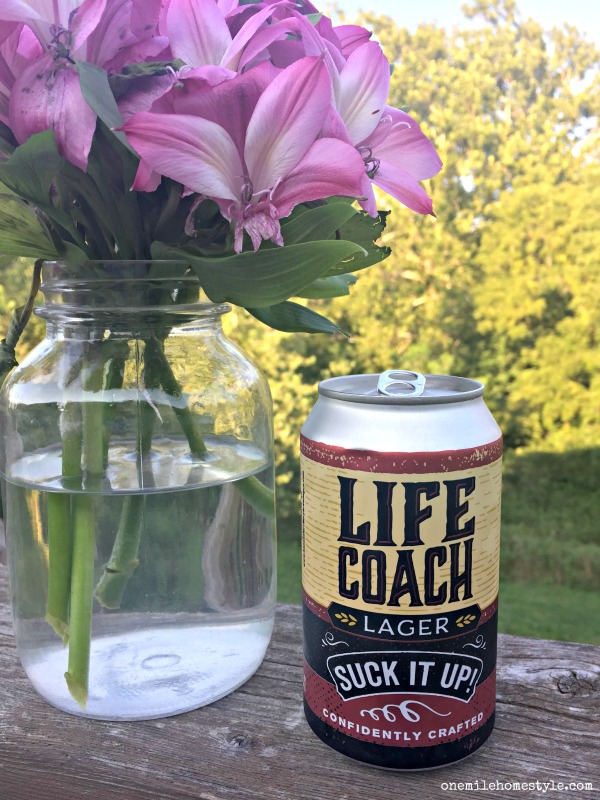 Summertime relaxing on the deck with Kansas Territory Life Coach Lager