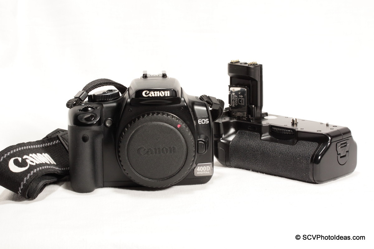 Canon EOS 400D w/ BG-E3 aside