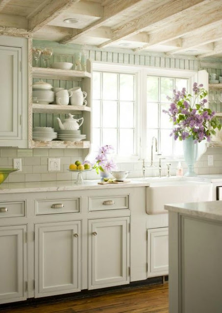 Gorgeous white kitchen with country decoor and aqua painted beadboard - found on Hello Lovely Studio