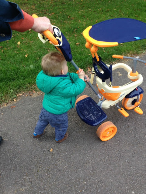 toddler pushing trike