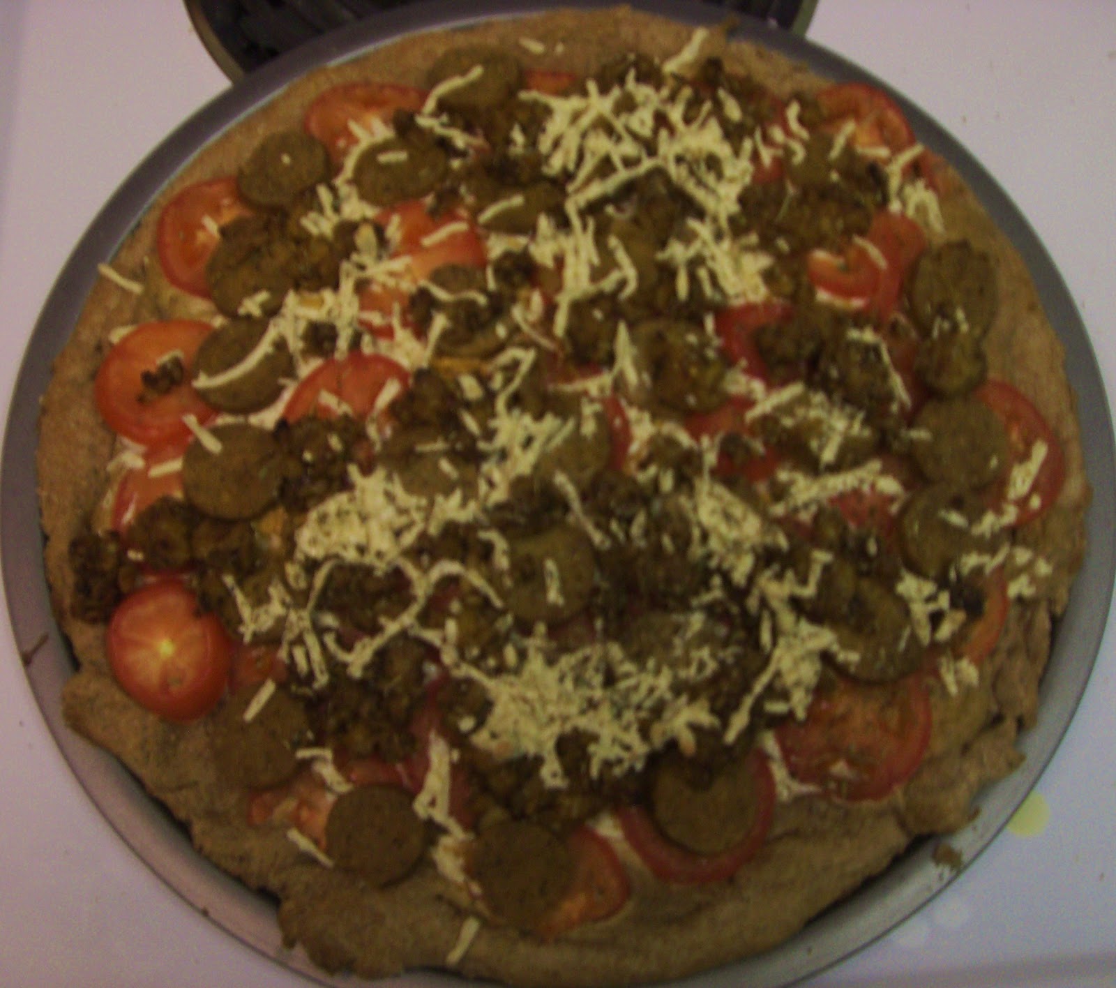 AfroVeganChick Cauliflower Walnut Cream Pizza Topped With Daiya