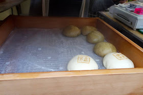 Meat buns at Ginkakuji Temple Street Kyoto Japan