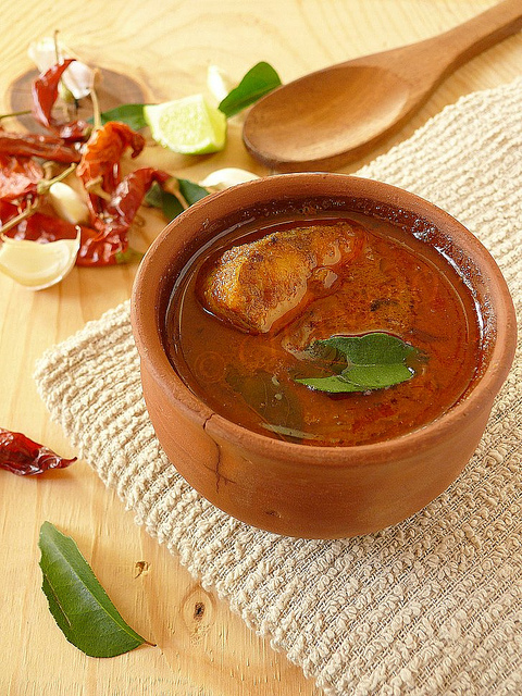 Magur Maas Aru Narasingha Pator Anja (Cat Fish Cooked With Curry Leaves)