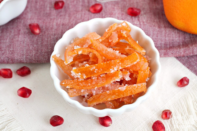 Combining the sweetness of fresh citrus with just a hint of tart pomegranate, this Candied Pomegranate-Mandarin Orange Peel is a must-make for the holiday season.