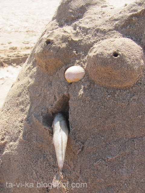 кот скульптура из песка