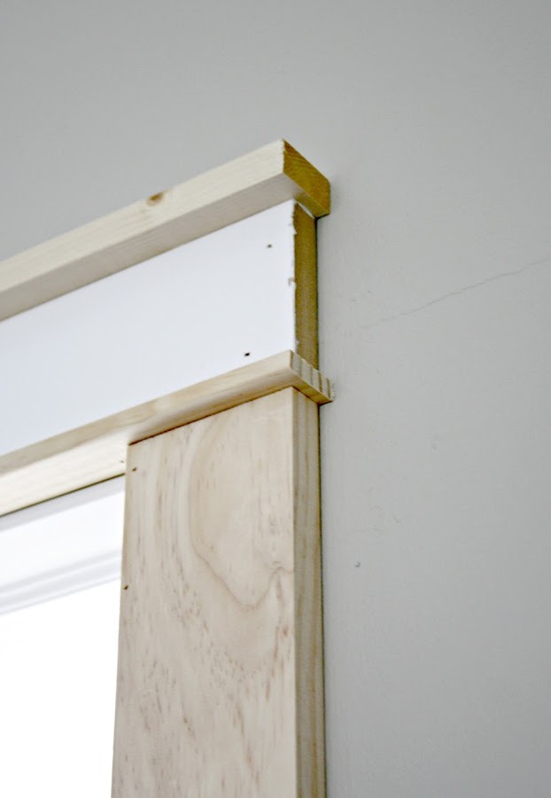 Hardwoods in the loft and adding farmhouse door trim from Thrifty Decor