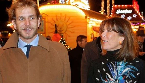 Princess Caroline of Hanover, right, and her eldest son Andrea Casiraghi, attend the opening of the Christmas village
