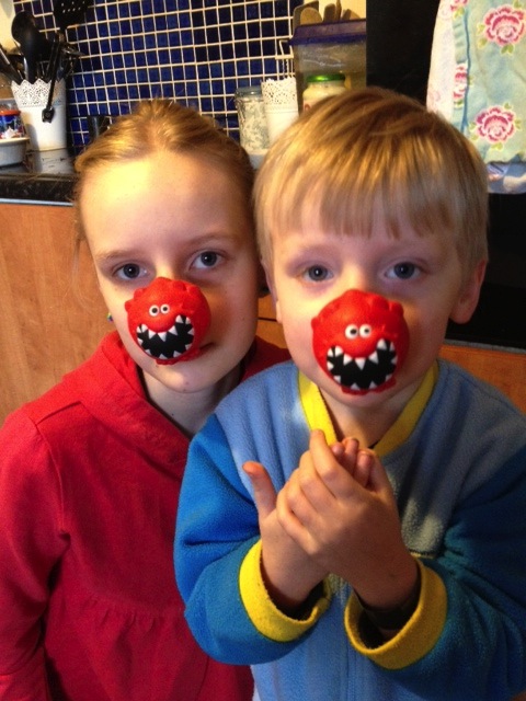 children wearing red noses for Comic Relief