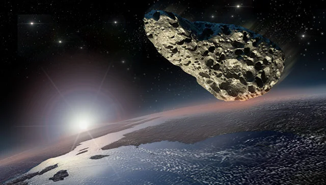 Two asteroids approach the Earth