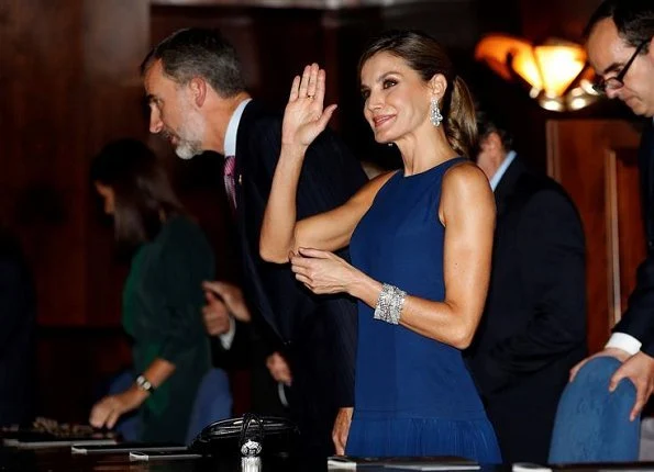 Queen Letizia Carolina Herrera top and skirt at Princess of Asturias Awards concert. white gold diamond earring