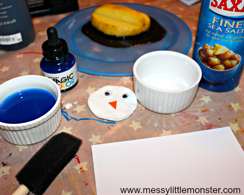 Easy penguin craft for kids. Potato print penguin art using a fun art process idea for the icy sky that uses liquid watercolour paint and sea salt. A quick and exciting winter or antarctic themed project activity for toddlers, preschoolers and older kids.  Also works well if making a DIY penguin fact book.
