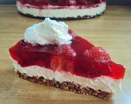 A lower carb, sugar-free strawberry jello dessert with real whipped cream!
