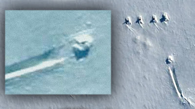 Crashed UFO guarded by Tanks in Antarctica.