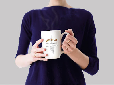 Woman Holding A Coffee Mug Mockup PSD