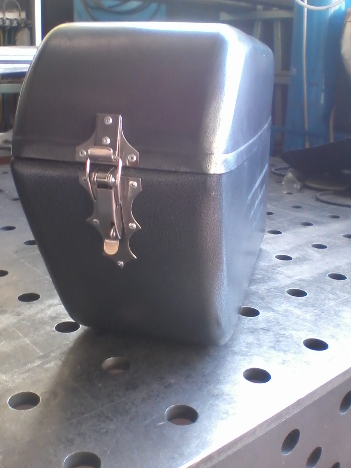 Handmade rigid metal saddlebags - The Chopper Compendium