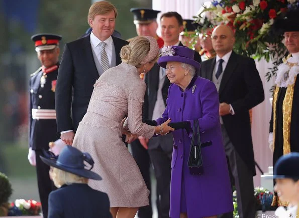 Queen Elizabeth II, Prince Charles and Camilla, Duchess of Cornwall. state banquet at Buckingham Palace. Maxima wore a new jacket by Claes Iversen