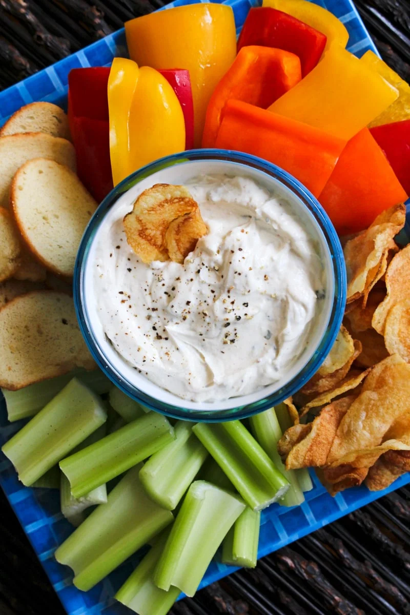 Kicked-Up Greek Yogurt Ranch Dip is made with tangy Greek yogurt, ranch dressing mix, and zippy spices. You will want to make this dip again and again!  #appetizer #greekyogurt #ranchdip