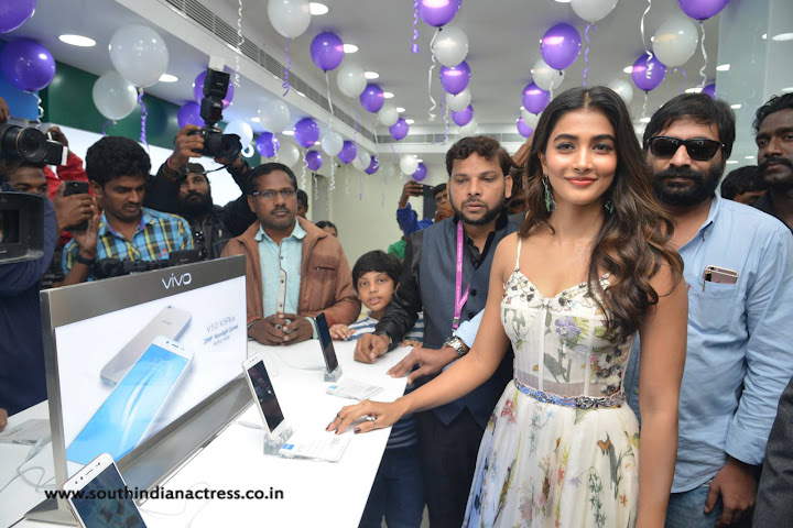 Pooja Hegde at Lot Mobile Store in Vijayawada