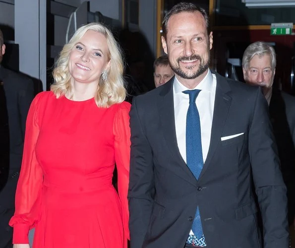 Crown Princess Mette-Marit wore red dress and  Nicholas Kirkwood Lace Pumps. at Olympic Amphitheater