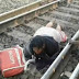A woman miraculously survived being run over by a 42-carriage goods train in India