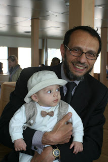 Mehmet, a vapur friend, and his son.