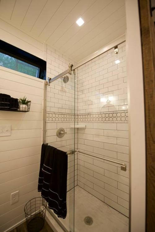 06-Shower-Room-Cargohome-Sustainable-Two-Story-Tiny-Home-Shipping-Containers-www-designstack-co