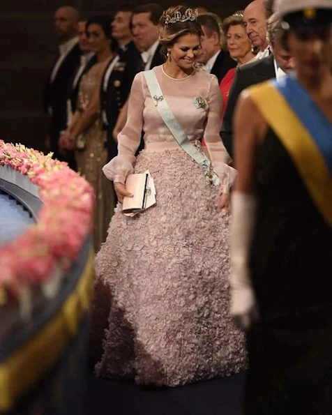 Queen Silvia, Crown Princess Victoria, Prince Daniel, Prince Carl Philip, Princess Sofia, Princess Madeleine and Christopher O'Neill attended 2016 Nobel award ceremony at Stockholm Concert Hall